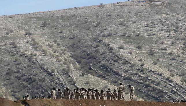 Volunteers to fight the Islamic State, from different Iraqi factions including Kurdish and Yazidis, train at a camping area near Kurdish security points on Bashiqa mountain, around 15km Northeast of the Islamic State held city of Mosul