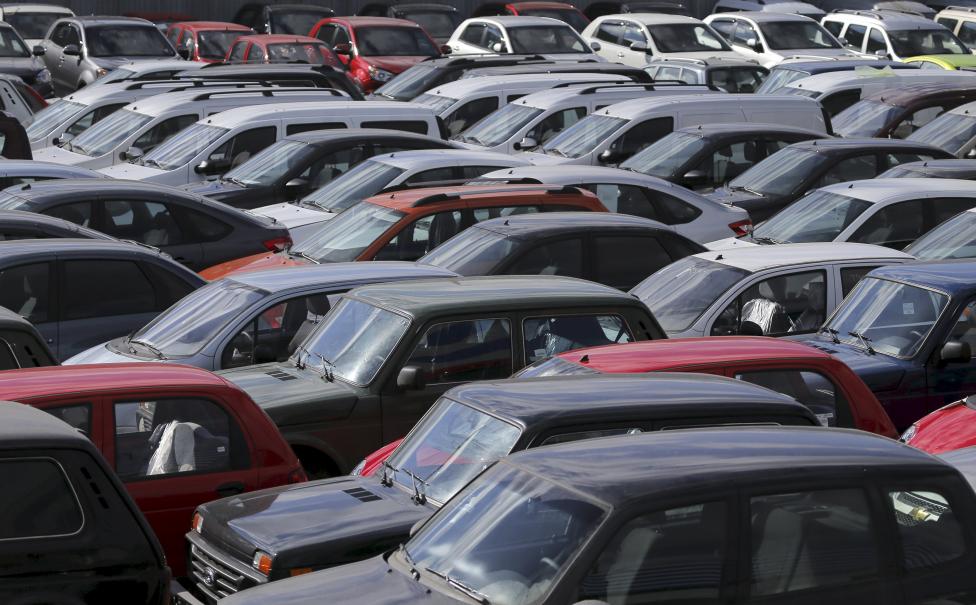 Vehicles, including Lada cars produced by the Russian automobile maker Avtovaz, are parked on the premises of the 'AvtoGermes' dealership in Moscow, Russia, in this March 14, 2016 file picture. REUTERS/Maxim Shemetov