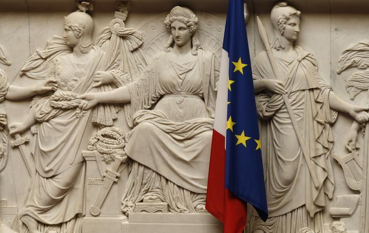 France and European flags are seen at the National Assembly, where the French prime minister delivers a speech following Britain's referendum results last week to leave the European Union, in Paris, France, June 28, 2016. REUTERS/Jacky Naegelen